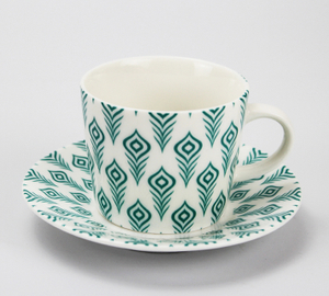 Small cup and saucer with peacock feather pattern
